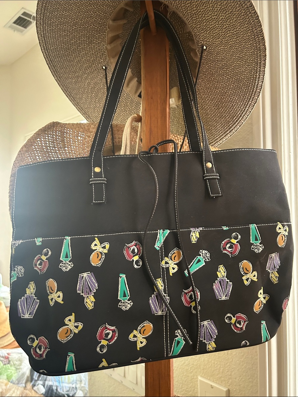 Chic Black Tote with Colorful Perfume Bottle Print
